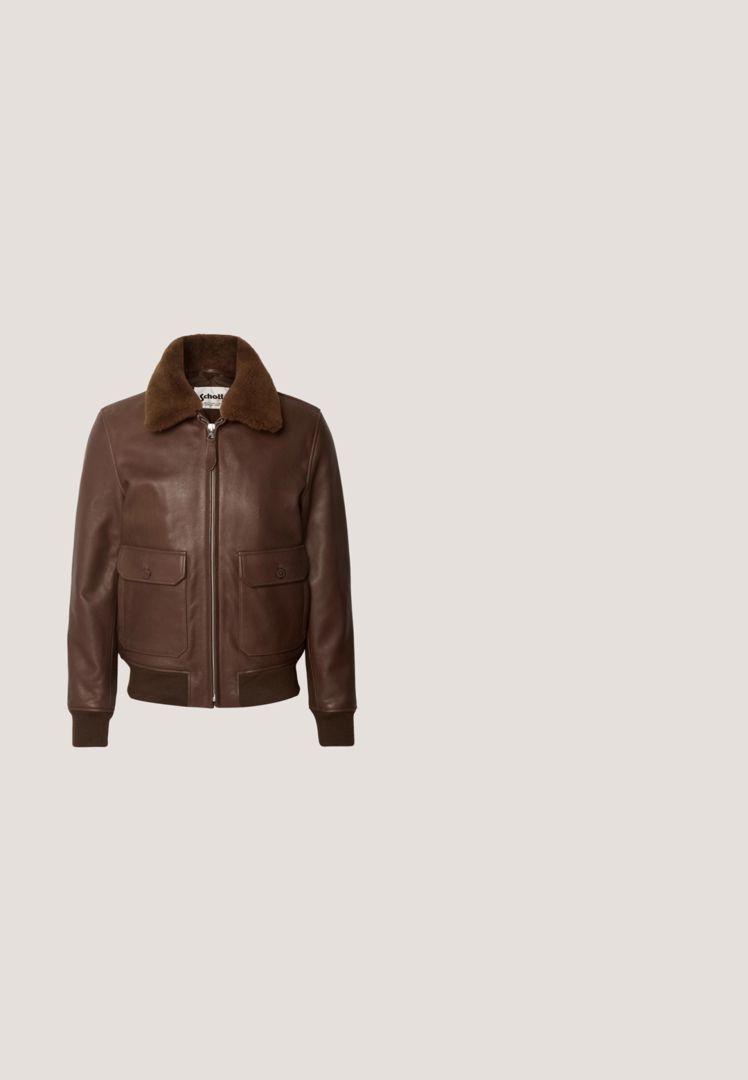Schott Bomberjakke - brown; Langærmet skjorte med knapper, blå og sort ternet mønster, to brystlommer med knapper og spids krave på hvid baggrund.; Lyseblå denim jeans med lige ben design, der har slidte områder, fem lommer og synlige syninger. Klassisk metalspænde.; Brune læder cowboystøvle med en høj skaft, spids tå, intrikate syning mønstre og en lille hæl. Struktureret finish hele vejen igennem.; Rød bandana-agtig tørklæde med hvid paisley mønster, bundet i en løkke. Fremstillet af blødt stof, der har en glat tekstur og afrundede kanter.; Brunt læderbælte med sølvspænde, dekoreret med små sølvnitter og turkissten i diamantmønster, rullet mod en hvid baggrund.