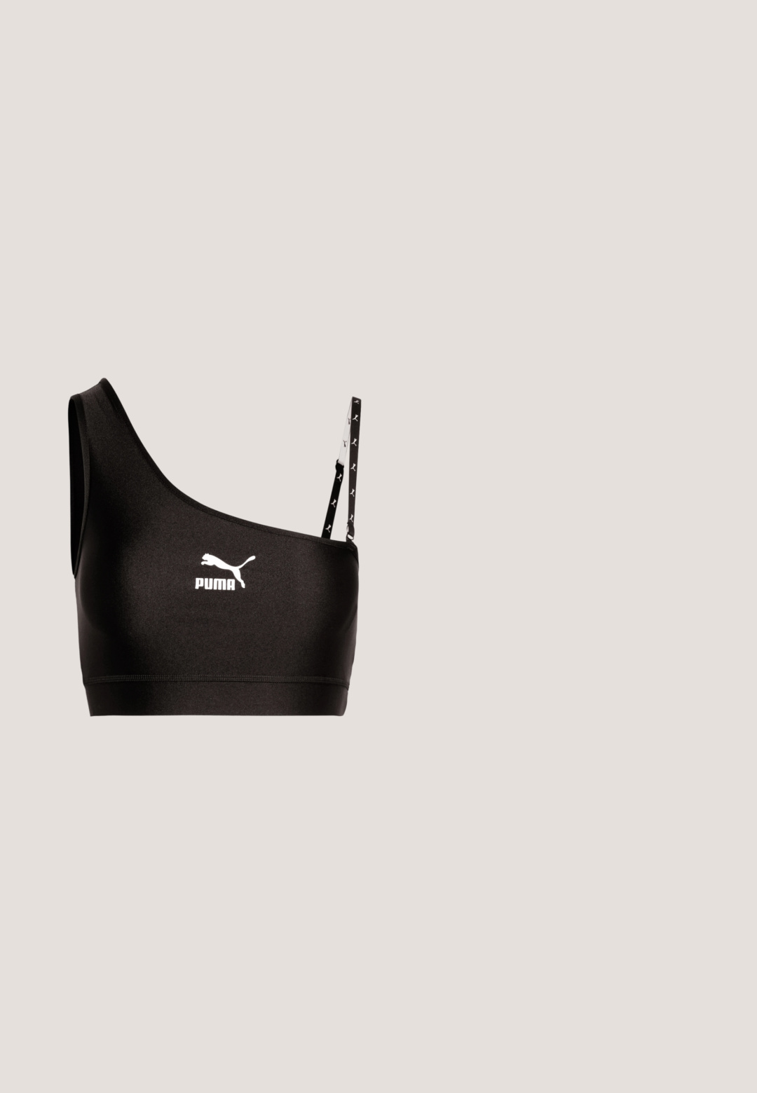 Čierny športový podprsenka s jedným ramienkom, s bielym logom Puma. Hladká, elastická tkanina s elegantným dizajnom a kontrastnými detailmi na ramienku.; Čierne cyklistické šortky s priliehavým strihom, elastickým pásom a hladkým povrchom. Dĺžka nad kolená. Žiadne viditeľné vzory ani ozdoby.; Buffalo BINARY TRACK - Sandále na platforme - black; Čierne slnečné okuliare s ovalnými rámami, tmavými sklíčkami a nápisom "vogue" vytlačeným bielou farbou na vonkajších ramenách. Hladký plastový materiál.; Čierna nylonová taška cez rameno so zakriveným tvarom, strieborným reťazovým akcentom, odnímateľnou mini taškou a nastaviteľným popruhom; má logo "Steve Madden".; Strieborné kruhové náušnice s hladkým, okrúhlym tvarom a lešteným povrchom. Obe náušnice sú rovnakej veľkosti a disponujú bezpečným uzatváracím mechanizmom.