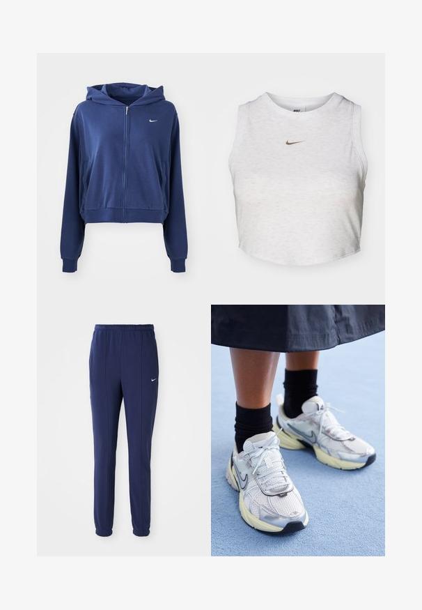 Sudadera con cremallera de color azul marino, fabricada en tejido suave, con capucha, bolsillos laterales y un pequeño logotipo blanco en el lado izquierdo del pecho. Diseño corto.; Top corto blanco hecho de una tela suave y texturizada. Presenta un cuello redondo y un diseño sin mangas, con un pequeño logotipo dorado de Nike en la parte delantera.; Pantalones deportivos azul marino con cintura elástica, piernas ajustadas y logo de Nike blanco en el lado izquierdo. Hechos de una tela suave.; Zapatillas Nike blancas y plateadas con tejido de malla, detalles reflectantes y una suela beige. Llevadas con calcetines negros, de pie sobre una superficie azul.