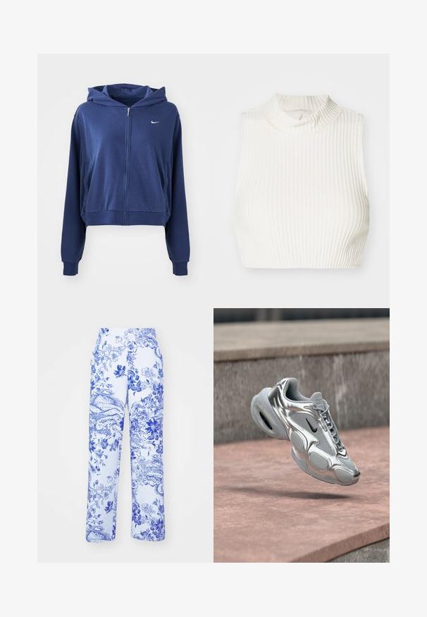 Sweat à zip couleur bleu marine en tissu doux, doté d'une capuche, de poches latérales et d'un petit logo blanc sur la poitrine gauche. Design court.; Crop top sans manches en ribbed blanc avec un col haut et un subtil détail de boutons au niveau du col, fabriqué à partir d'un tissu lisse et extensible.; Pantalon blanc avec imprimé floral et paysage bleu, présentant une coupe droite et des poches latérales. Le tissu a une finition texturée.; Baskets Nike Air argentées et grises avec un swoosh noir flottant au-dessus d'une surface en béton rosâtre et un fond de rebord en pierre.