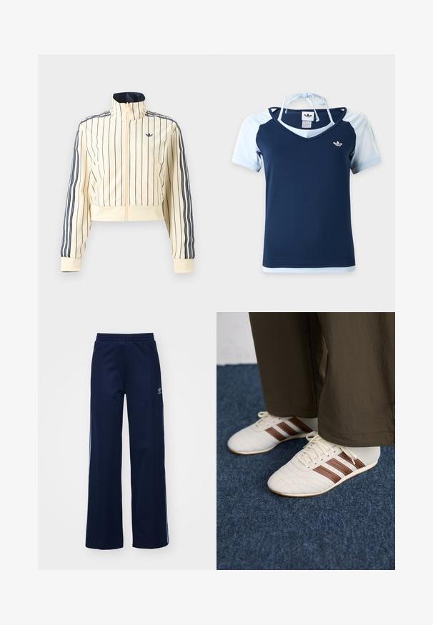Krémová krátka bunda na zips s tmavomodrými vertikálnymi pruhmi, tromi tmavomodrými pruhmi na rukávoch a logom Adidas trefoil na hrudi.; Adidas top s krátkym rukávom v námorníckej modrej a svetlomodrej farbe, s výstrihom do V, logom na hrudi a halter pásikom viazaným na zadnej strane krku.; Námornícke nohavice z bavlneného zmesi s širokým strihom, elastickým pásom a zipsovými vreckami, s bielymi bočnými pruhmi a detailom loga.; Biele tenisky s hnedými pruhmi nosené s hnedými nohavicami na modrom kobercovom podlahe.