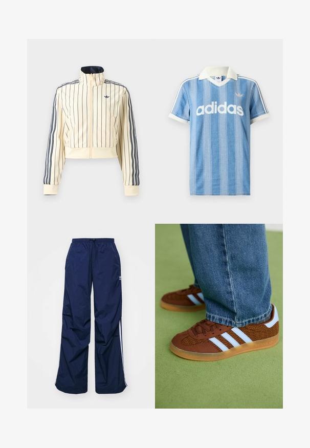 Krémová krátka bunda na zips s tmavomodrými vertikálnymi pruhmi, tromi tmavomodrými pruhmi na rukávoch a logom Adidas trefoil na hrudi.; Svetlomodré polokošeľa s krátkym rukávom s vertikálnymi pruhmi, bielymi akcentmi a výrazným bielym logom „adidas“ na prednej strane.; Tmavomodré, ľahké nohavice s elastickým pásom a sťahovacou šnúrkou, so svetlými bočnými pásmi a malým logom na prednej strane. Strih voľného strihu.; Hnedé tenisky Adidas s bielymi prúžkami a hnedou gumovou podrážkou, obuté s modrými džínsami na zelenej koberci.