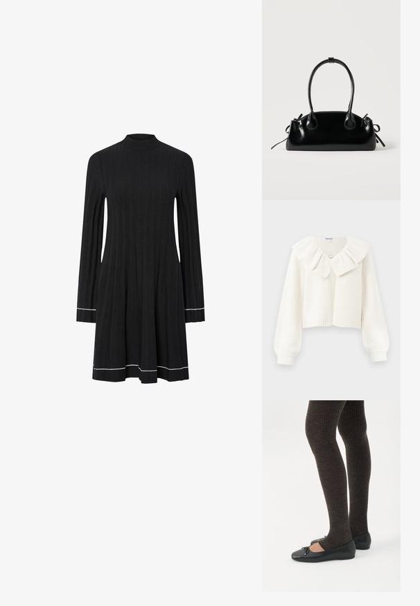Hvid cropped cardigan med ribstrikkede manchetter og kant, der har en stor flæset krave og en dekorativ sølvknap ved halsen.; Sort ribbet striklangærmet kjole med høj hals og hvide kantdetaljer på ærmer og kant.; Ben iført mørke ribbede leggings kombineret med sorte balletsko med små sløjfedetaljer på hvid baggrund.; Lille sort blank håndtaske med to lange håndtag og snøre-detaljer i siden på en ensfarvet lys baggrund.