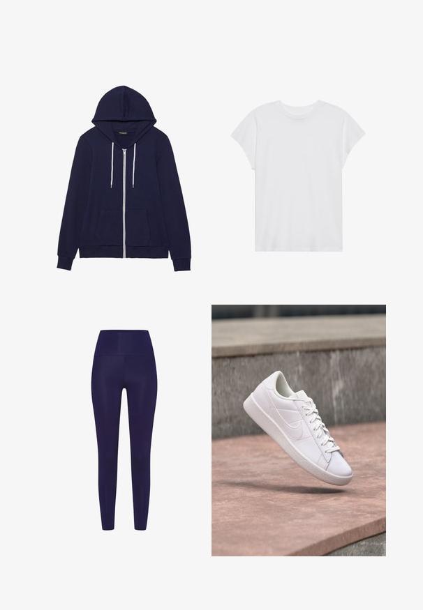 Sudadera con cremallera azul marino, con bolsillo tipo canguro, cordones blancos y puños acanalados. Confeccionada en un suave tejido texturizado.; Camiseta blanca de manga corta con cuello redondo, corte relajado, hecha de suave tela de algodón. Textura lisa, sin estampados ni logotipos.; Leggings azul marino con una cintura alta, hechos de un material liso y elástico. El diseño presenta una forma ajustada sin patrones.; Zapatilla baja blanca de Nike con cordones suspendida sobre un borde de concreto contra un fondo de piedra gris al aire libre.