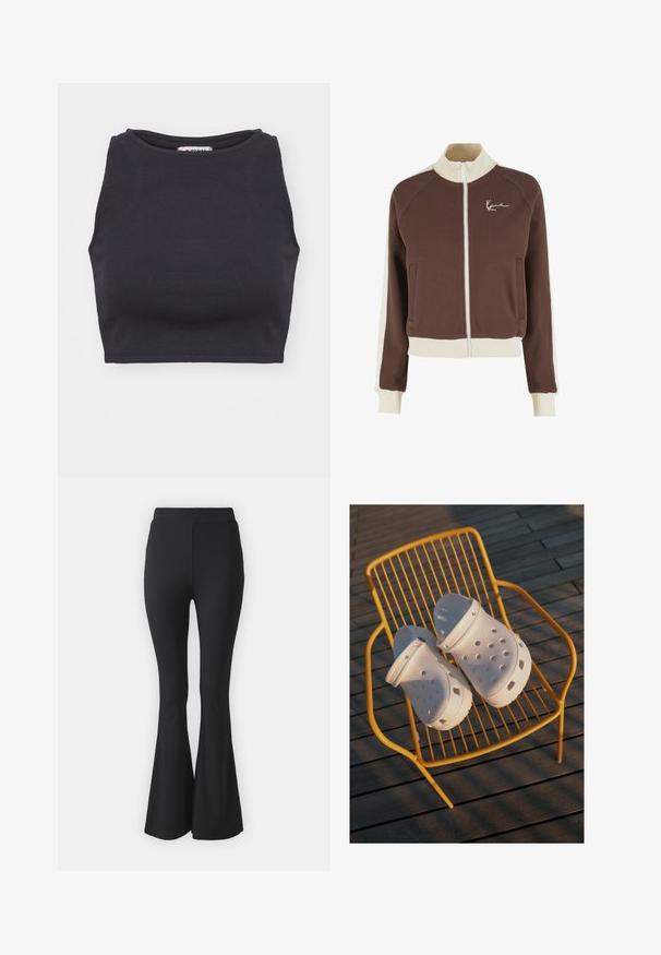 Braune Jacke mit Reißverschluss und Stehkragen, weiße Akzente an den Ärmeln, zwei Fronttaschen und ein weiß gesticktes Logo auf der Brust.; Schwarzes geripptes Crop-Top mit rundem Halsausschnitt und ärmellosem Design. Glatte Textur, taillierte Form und minimalistischer Stil.; Schwarze ausgestellte Hosen aus elastischem Stoff. Sie haben einen hohen Bund und ein glattes, eng anliegendes Design, das ab dem Knie nach unten ausgestellt ist.; Weiße Crocs Clogs zeichnen sich durch ein perforiertes Design, flache Sohlen und verstellbare Fersenriemen aus und stehen auf einem gelben Drahtstuhl auf einem Holzfußboden.