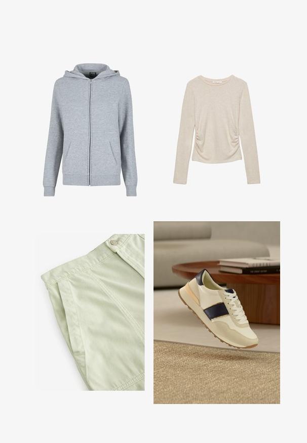 Grå zip-up hættetrøje lavet af blødt, tekstureret stof. Har en hætte med snoretræk og to forlommer. Mansjetter og kant er ribbede.; Beige langærmet top med rund halsudskæring og samlet detaljering i siderne, lavet af et blødt, textured stof.; Lys grønne plisserede shorts lavet af et struktureret stof. Har en knaplukning og synlige syninger langs taljen og sømmene.; Hvid og marineblå sneaker med beige accenter, der svæver over et vævet tæppe ved siden af et træ sofabord med stabler af bøger.