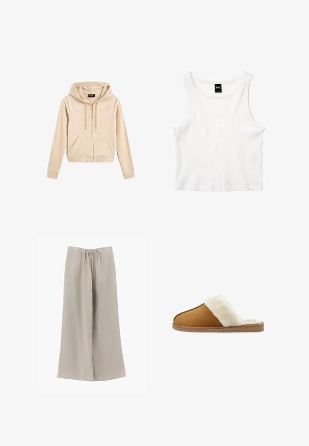 Lichtbeige zip-up hoodie van zachte stof, met een capuchon, voorzakken en een goudkleurige rits met subtiele logo-borduring op de borst.; Witte geribbelde mouwloze cropped top met ronde halslijn en een klein zwart labeltje midden achteraan bij de kraag.; Beige broek met wijde pijpen, een elastische tailleband, een plooi aan de voorkant en een losse pasvorm, weergegeven op een effen witte achtergrond.; Bruine suède pantoffel met een witte bontkraag, open te ontwerp, zachte textuur en een platte rubberen zool. Heeft contraststiksel voor detail.