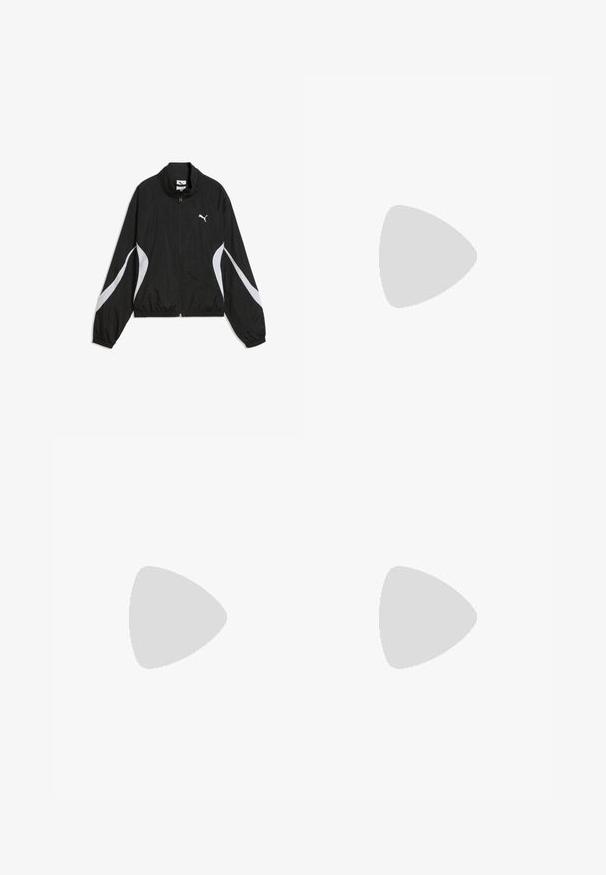 Chaqueta negra Puma con cremallera, con rayas curvas blancas en las mangas y el frente, puños y dobladillo elásticos, y logo de Puma en el pecho.; Camiseta blanca acanalada de manga corta con escote redondo y un pequeño logo negro de Puma en el centro del pecho.; Pantalones de chándal color crema hechos de una tela suave, con cintura elástica, bolsillos laterales y un pequeño logo negro en el muslo izquierdo.; Piernas cruzadas con zapatillas Puma beige con rayas de estampado de leopardo y calcetines crema con volantes sobre una alfombra azul.