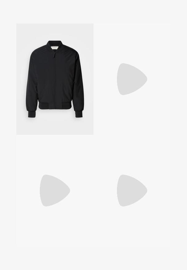 Veste bomber noire en tissu lisse, avec une fermeture éclair à l'avant, des poignets côtelés et un col classique. Design minimaliste sans motifs.; T-shirt de sport noir à manches courtes avec empiècements en mesh sur le haut de la poitrine et les épaules, arborant le logo "Calvin Klein" centré sur le devant.; Pantalon de survêtement noir avec des panneaux latéraux gris foncé et un liseré blanc, taille et poignets élastiques, présenté sur un fond blanc.; Baskets Calvin Klein noires avec tige en mesh et synthétique, semelle épaisse et lacets, présentées flottant au-dessus d'un sol gris près de blocs de verre.