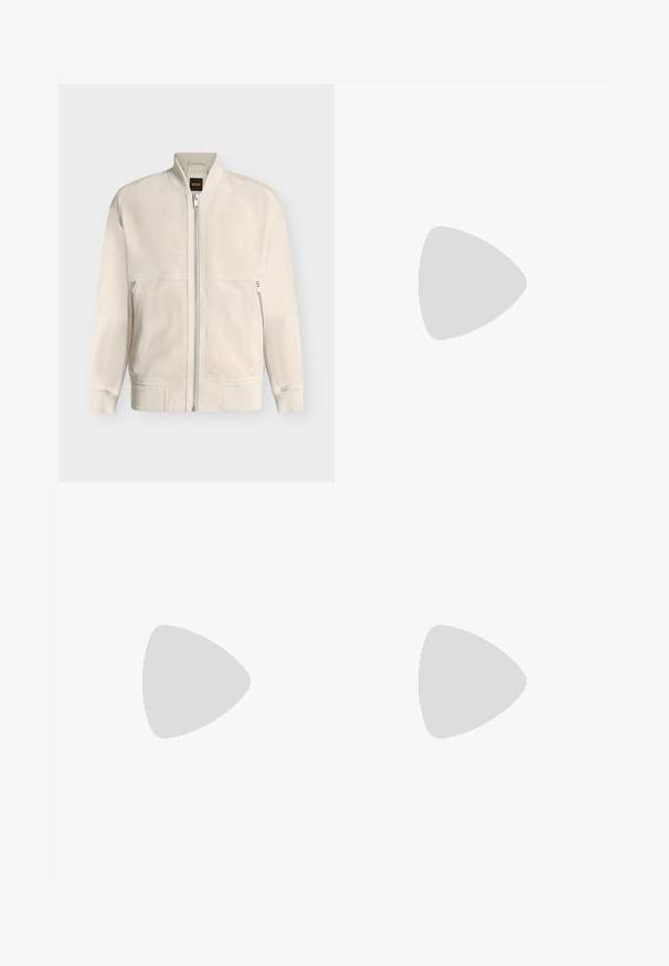 Veste bomber beige clair à fermeture éclair, avec col, poignets et ourlet côtelés, dotée de deux poches latérales zippées et d'une petite étiquette noire à l'intérieur du col.; Chemise blanche à manches longues avec fines rayures verticales, boutonnée à l'avant, col boutonné et logo discret sur la poitrine.; Jean en denim noir taille haute avec fermeture à bouton et à glissière, poches avant et arrière, et coupe droite.; Mocassin homme en cuir noir avec couture moc toe, bride penny, col texturé et petit talon empilé sur fond blanc.