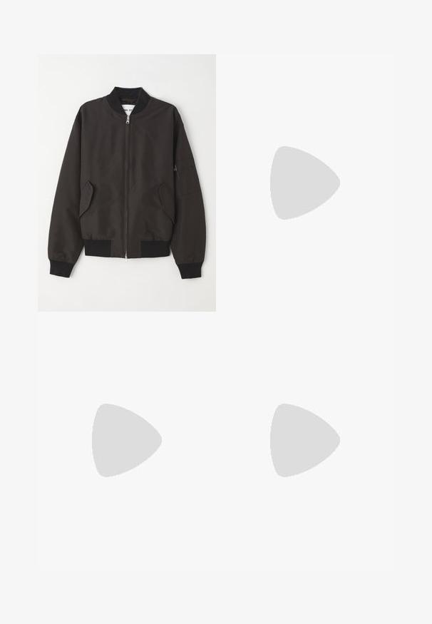 NN.07 Blouson Bomber - black; T-shirt blanc à manches courtes avec un logo Emporio Armani Milano noir présentant un graphisme d'aigle au centre devant.; Pantalons de jogging noirs en tissu doux avec une taille élastique et un cordon de serrage. Présente des jambes fuselées avec des poignets côtelés.; Baskets basses blanches avec un onglet de talon gris, des lacets blancs et une semelle texturée, présentées sur un fond uni clair.