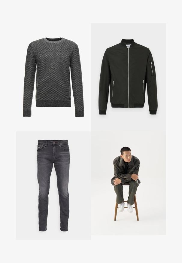 Chaqueta bomber negra con cremallera frontal, dos bolsillos laterales con cremallera, bolsillo con cremallera en la manga izquierda, y cuellos, puños y dobladillo acanalados.; Suéter de punto gris con un patrón texturizado, cuello redondo y mangas largas. Presenta un dobladillo y puños de canalé.; Jeans de hombre de corte slim en gris oscuro con cinco bolsillos y cierre de botón, con ligeros desgastes y detalles de decoloración sutiles.; Joven con chaqueta de cuero oscura y vaqueros sentado en un taburete de madera, inclinado hacia adelante con los brazos cruzados, mirando hacia un lado contra un fondo blanco.