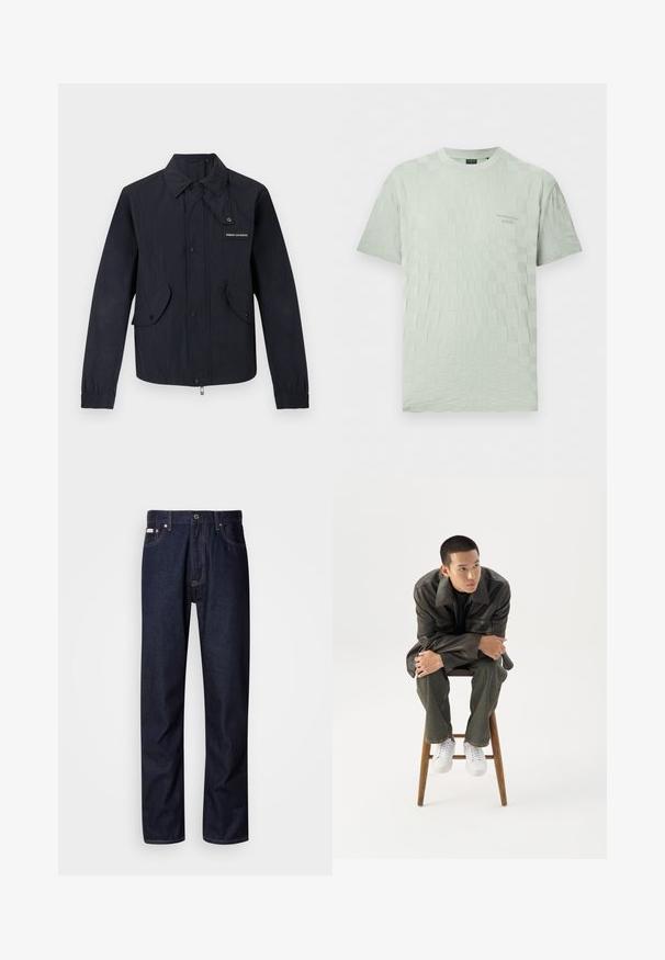 Veste noire légère avec boutons-pression à l'avant, deux poches à rabat, poignets élastiques, et petit logo "Armani Exchange" sur la poitrine.; T-shirt vert clair à manches courtes avec un subtil motif à carreaux et un petit logo en relief sur la poitrine gauche, col rond.; Jean en denim bleu foncé avec une coupe droite, présentant une braguette à boutons, cinq poches et des détails de coutures contrastantes.; Jeune homme en veste en cuir foncée et jean, assis sur un tabouret en bois, penché en avant, les bras croisés, regardant sur le côté sur fond blanc.
