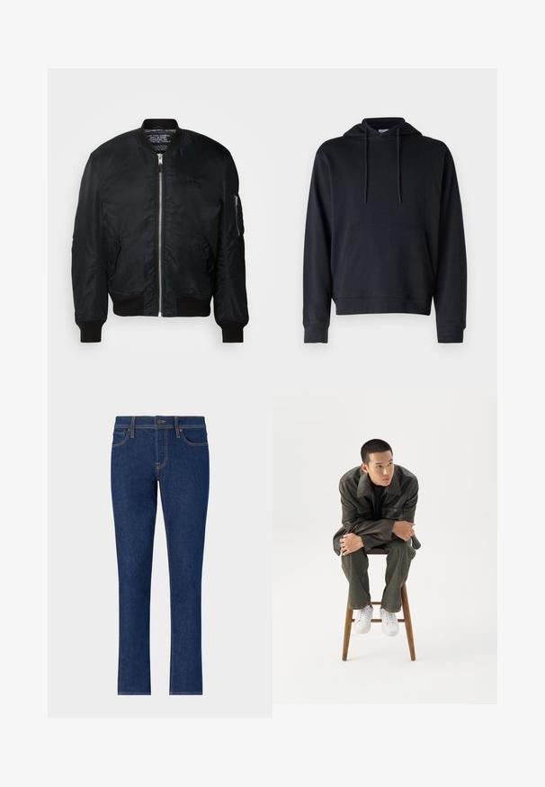Zwarte nylon bomberjack met een ritssluiting, geribbelde manchetten en een zak op de linkermouw met ritshardware. Glad, lichtgewicht textuur.; Zwarte hoodie van een katoenmix, met een buidelzak, verstelbare koordjes en ribgebreide manchetten en zoom. Eenvoudig ontwerp.; Donkerblauwe denim jeans met een recht model, voorzien van subtiele stiksels, vijf zakken en een knoopsluiting bij de taille.; Jonge man in een donkere leren jas en spijkerbroek zit op een houten kruk, leunt naar voren met gekruiste armen en kijkt naar de zijkant tegen een witte achtergrond.
