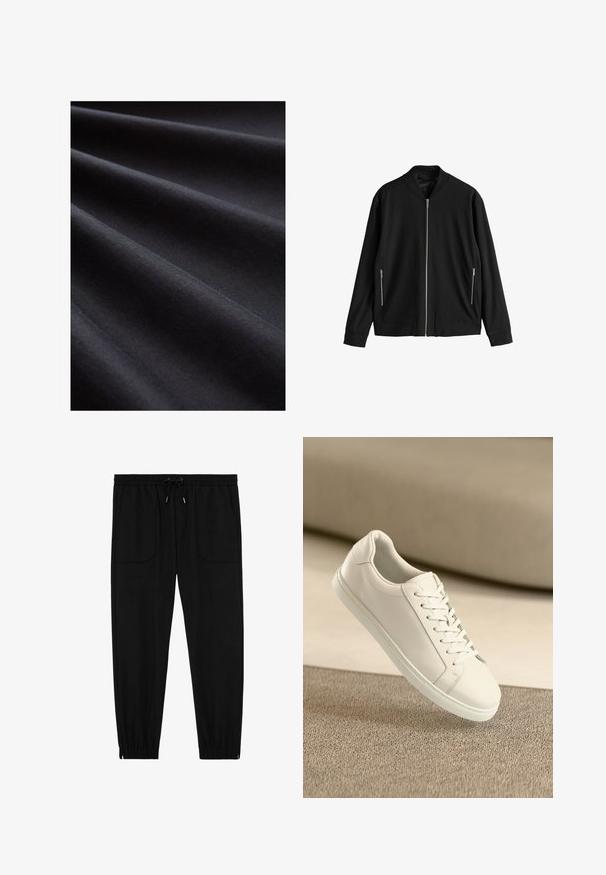 Chaqueta bomber negra de manga larga con cremallera frontal y dos bolsillos laterales con cremallera, mostrada extendida sobre un fondo blanco.; Tela negra con una textura suave, que presenta capas dobladas que crean suaves ondas, enfatizando su superficie mate y suave.; Pantalones jogger negros con cintura elástica, cordón ajustable, bolsillos frontales de parche y puños elásticos sobre un fondo blanco.; Zapatilla de cuero blanca con cordones blancos, exhibida sobre una superficie texturizada beige y un suave fondo desenfocado.