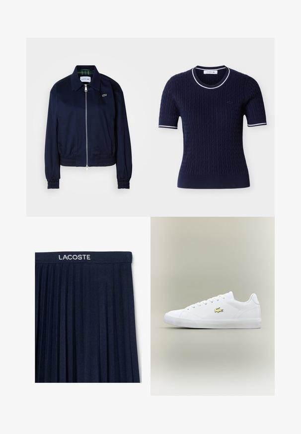 Mørkeblå cropped jakke lavet af glat stof, med en front lynlås lukning, elastiske manschetter og et diskret logo på brystet.; Marineblå kortærmet strikketop med kabelmønster, hvid stribet kant på krave og ærmekanter samt lille broderet logo på brystet.; Marinblå plisseret nederdel med elastisk talje og hvid "LACOSTE" logo. Blød stofstruktur med lodrette plisseringer for bevægelse.; Hvid sneaker lavet af glat læder med en rund tå, flade snørebånd og et lille guld logo. Har en struktureret gummisål og et enkelt design.