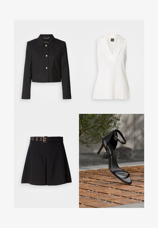 Zwart cropped jack met een kraag, vijf gouden knopen en twee voorzakken. Gemaakt van gladde stof met een strakke, op maat gemaakte pasvorm.; Witte mouwloze top met een V-halsontwerp, voorzien van een gedrapeerde kraag en een gladde, licht glanzende textuur. Ideaal om te combineren in lagen.; Zwarte geplisseerde rok met een brede riem met gouden metalen hardware en oogjes, gemaakt van soepel materiaal, ontworpen voor een getailleerde pasvorm.; Zwarte hoge hak sandaal met enkelbandje zweeft boven een houten tegelvloer buiten, met een onscherpe groene en stenen achtergrond.