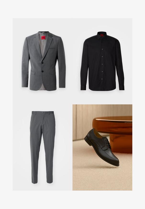 Grå skræddersyet blazer med klapkraver, to knapper og to frontlommer. Indersiden er foret med lys grå stof. Rød mærke synlig.; Sort langermet skjorte lavet af glat stof, med en klassisk krave, knaplukning foran og skræddersyet pasform.; Grå bukser lavet af et glat stof, der har en knaplukning, forlommer og en slim fit-design.; Sort læder snøresko, der svæver over beige tæppe med et rundt orange bord i baggrunden.