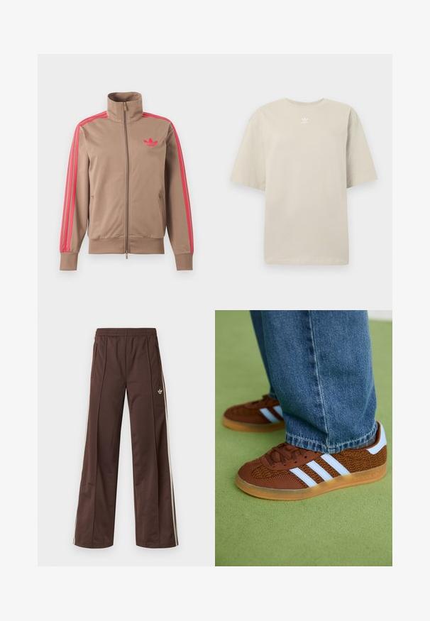 Lichtbruine trackjas met rits en hoge kraag, roze strepen op de mouwen en roze Adidas-logo op de linkerborst.; Beige T-shirt met korte mouwen van katoen, met een ronde hals en een klein wit Adidas-logo op de borst gedrukt. Zachte textuur, ontspannen pasvorm.; Bruine sportbroek met een wijd uitlopende pijp, witte zijstrepen, een elastische tailleband en twee zijzakken. Heeft een klein logo op het been.; Bruine Adidas sneakers met witte strepen en rubberen zolen, gedragen met blauwe jeans op een groene vloer.