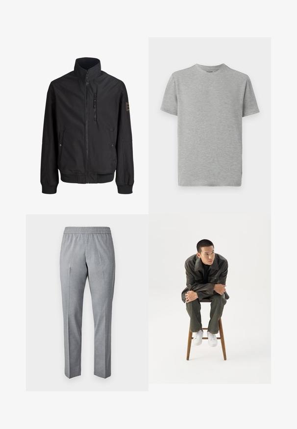 Veste légère noire avec col haut, fermeture éclair à l'avant, deux poches latérales avec boutons et une poche poitrine zippée.; T-shirt gris à manches courtes en tissu doux. Design à col rond avec une texture lisse et sans motifs ni accents visibles.; Pantalons gris, tissés, avec une taille élastique, coupe droite et pli sur le devant. La texture du tissu semble lisse et légère.; Jeune homme en veste en cuir foncée et jean, assis sur un tabouret en bois, penché en avant, les bras croisés, regardant sur le côté sur fond blanc.