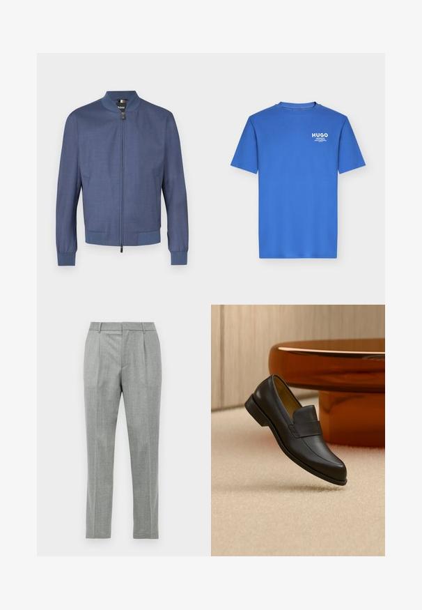 Veste aviateur bleu marine avec fermeture éclair à l'avant, poignets et col en bord-côte. Confectionnée en tissu lisse avec une texture subtile. Deux poches latérales.; T-shirt bleu à manches courtes et col rond avec petit logo blanc "HUGO" et texte sur la partie supérieure gauche de la poitrine.; Pantalons de costume gris clair avec plis avant, passants de ceinture et coupe droite sur fond blanc.; Mocassin en cuir noir à talon bas flottant au-dessus d'un sol moquetté beige près d'une table ronde marron.