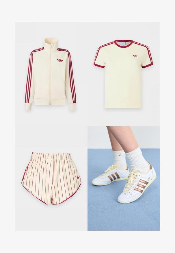Kremfarvet lynlås-træningsjakke med rødt tre-stribe-detalje på ærmerne og rødt Adidas trefoil-logo på brystet.; Kremfarvet Adidas T-shirt med korte ærmer, rød ribkant ved hals, ærmekanter, tre røde striber på skuldrene og rødt Adidas trefoil-logo på brystet.; Kremshorts med lodrette røde striber, elastisk taljebånd, to knapper foran og røde kanter langs buede kanter.; Hvide sneakers med bronze striber, tekstureret læder, gule snørebånd og perforerede detaljer. Båret med hvide ribbede sokker på en blød blå overflade.