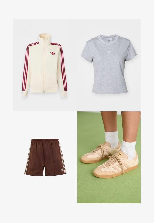 Krémová bežecká bunda na zips s červenými tromi pruhmi na rukávoch a červeným logom Adidas trefoil na hrudi.; adidas Originals ESS SLIM TEE - Základné tričko - medium grey heather; Hnedé športové šortky vyrobené z hladkej tkaniny s uvoľneným strihom, s bielymi bočnými pruhmi a vyšitým logom na dolnom ľavom okraji.; Nohy v béžových tkaných teniskách Adidas s gumovými podrážkami a bielymi členkovými ponožkami na zeleno textúrovanom podlahe.