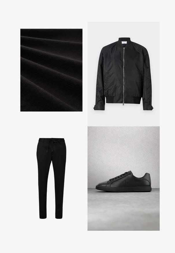 Chaqueta bomber negra de acabado satinado, con cierre de cremallera en la parte delantera, puños y dobladillo acanalados, y cuello redondeado. Textura suave sin patrones.; Tela negra con una textura suave, mostrada en pliegues, que exhibe un brillo sutil y un patrón de punto fino, resaltando su apariencia suave.; s.Oliver BLACK LABEL Pantalones - schwarz; Zapatilla deportiva de cuero negro con cordones y el logotipo "ck" en relieve, flotando sobre un suelo gris cerca de una pared de bloques de vidrio.