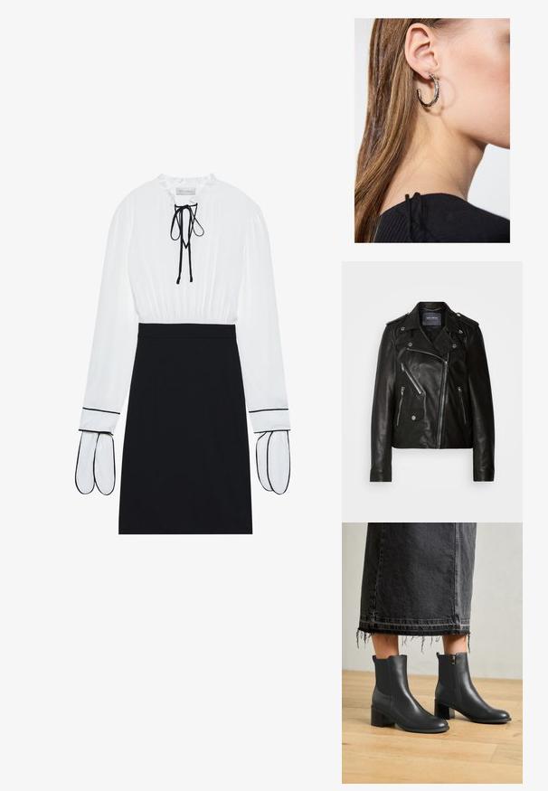 Schwarze Leder-Bikerjacke mit asymmetrischem Reißverschluss, silbernen Beschlägen und mehreren Reißverschlusstaschen. Mit Reverskragen und Schulterklappen.; Weiße Bluse mit gerafftem Ausschnitt und Kordelzug; schwarze, taillierte Rock mit kontrastierendem weißen Piping an den Ärmeln. Glatte Stoffstruktur.; Schwarze Leder-Ankle-Boots mit abgerundeter Spitze und Blockabsatz. Mit einem seitlichen Reißverschluss und glatter Textur. Getragen mit einem ausgefransten Denim-Rock.; Silberne Creolen mit polierter Oberfläche, die kleine goldene Akzentdetails und eine runde Form aufweisen, am Ohrläppchen getragen.