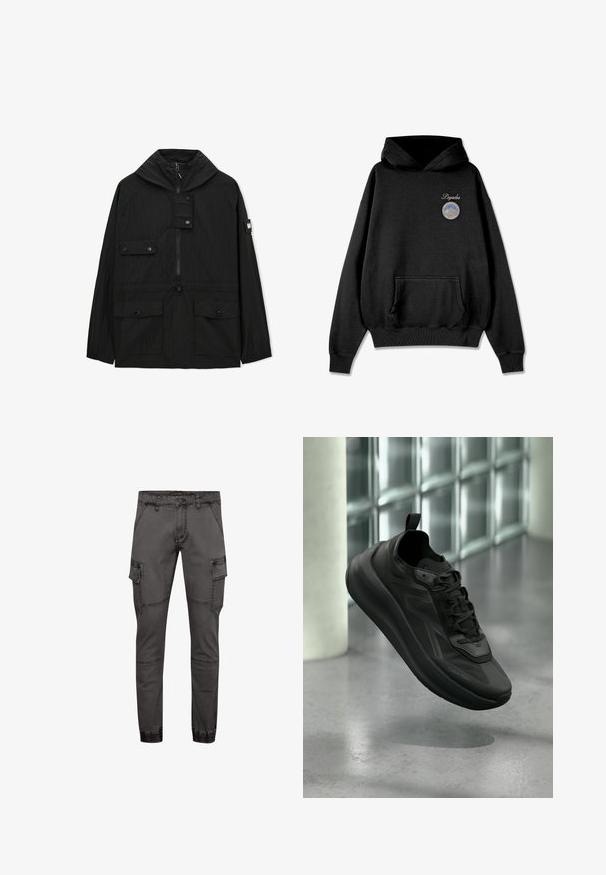 Veste noire à capuche avec fermeture éclair à l'avant, trois poches à rabat avec boutons, taille ajustable par cordon de serrage et détail patch sur la manche gauche.; Sweatshirt à capuche noir avec une poche avant, présentant un écusson rond sur la poitrine avec des images de montagnes et du texte. Tissu doux, design décontracté.; Pantalons cargo gris au design ajusté, fabriqués en denim, avec des poches latérales, des coutures texturées et des ourlets élastiqués pour un ajustement confortable.; Baskets noires Calvin Klein avec lacets, surélevées au-dessus d'un sol en béton poli, mur en blocs de verre et pilier en arrière-plan flou.