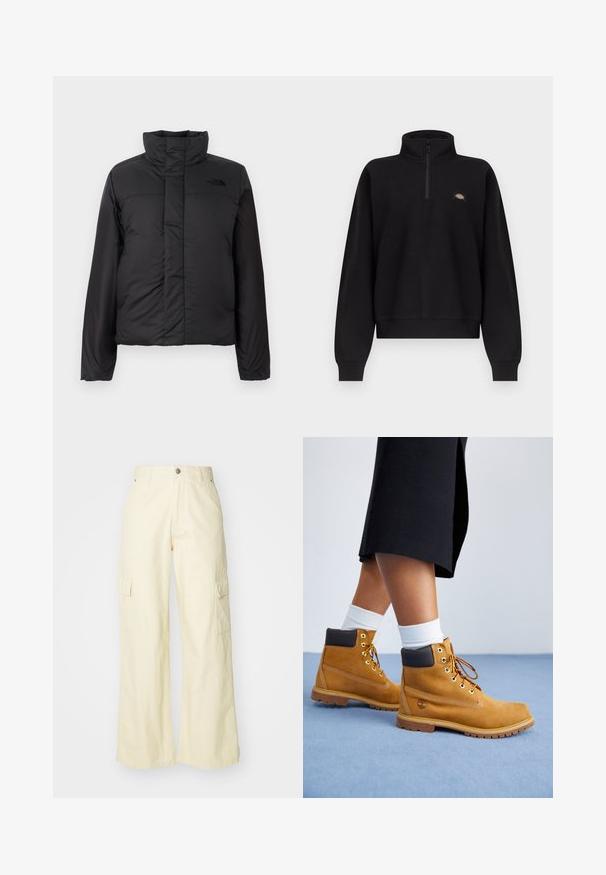 Zwarte geïsoleerde pufferjack met een hoge kraag, ritssluiting aan de voorkant en een logo op de borst. Gladde, matte afwerking met een boxy vorm.; Zwarte pullover met lange mouwen, een korte ritssluiting bij de kraag en een klein meerkleurig logo op de linkerborst, met geribbelde manchetten en zoom.; Brede cargobroek van lichtgele katoen. Voorzien van twee zijzakken en een knoopsluiting. Glad textuur met een relaxte pasvorm.; Tan suède enkellaarsjes met bruine leren accenten, gouden oogjes en een getextureerde zool. Witte sokken zichtbaar boven de laarsjes.