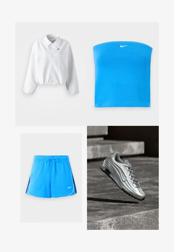 Witte cropped jas met een kraag, elastische tailleband en lange pofmouwen. Bevat een zwart Nike-logo op de linkerkant van de borst. Gladde stof textuur.; Felblauwe Nike strapless tube top met wit Swoosh-logo centraal geplaatst dicht bij de bovenkant.; Blauwe sportshorts met witte biezen langs de randen, donkerblauwe zijpanelen, elastische tailleband, trekkoord en een klein wit Nike-logo aan de voorkant.; Zilveren Nike-sneaker met gestructureerd zijontwerp en grijze veters zwevend boven betonnen traptreden in een gedempte buitenomgeving.