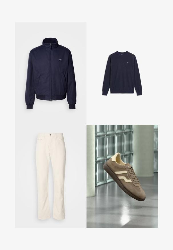 Veste bomber bleu marine en tissu lisse, avec un col montant, fermeture éclair frontale, poignets élastiques et poches latérales. Détail de logo subtil présent.; Pull bleu marine à manches longues avec poignets et ourlet côtelés, col rond, et petit logo blanc "CK" sur la poitrine gauche.; Jeans en coton beige avec un design classique à jambe droite, comportant une fermeture à bouton à l'avant, cinq poches et des détails de couture subtils.; Baskets en daim marron avec des accents crème et une semelle en caoutchouc foncée flottant à l'intérieur contre un mur en verre et des piliers en béton.
