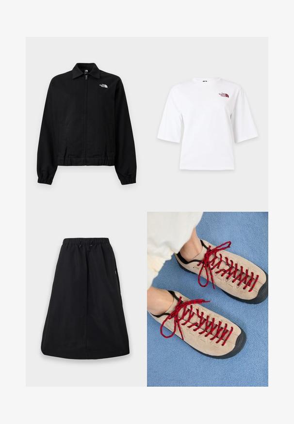 Veste noire à fermeture éclair avec poignets et taille élastiques, col, poches latérales, et logo blanc "The North Face" sur la partie supérieure gauche de la poitrine.; T-shirt blanc à manches courtes, col rond, avec un petit logo "The North Face" bordeaux sur la partie supérieure gauche de la poitrine.; Jupe trapèze noire avec ceinture élastique et cordon de serrage ajustable, longueur genou, design uni avec poches latérales.; Des chaussures beiges avec des lacets rouges, posées sur une surface bleue texturée, révèlent partiellement la cheville d'une personne. Les chaussures ont un design sportif.