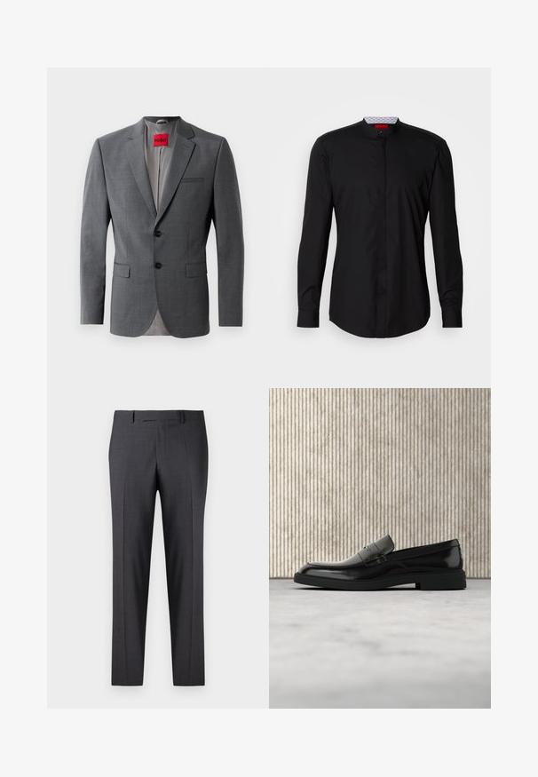 Grijze op maat gemaakte blazer met gekleurde revers, twee knopen en twee voorkruiszakken. Binnenkant gevoerd met lichtgrijze stof. Rode merklabel zichtbaar.; Zwart shirt met lange mouwen en een mandarijnkraag, gemaakt van een gladde stof, met een knoopsluiting aan de voorkant en subtiele designdetails.; Op maat gemaakte donkergrijze broeken van een soepel, gestructureerd weefsel; heeft een vlakke voorkant en rechte pijpen; minimalistisch ontwerp zonder zichtbare accenten.; Zwarte gepolijste leren loafer die boven een beige tapijt zweeft met oranje doorschijnend meubilair op de achtergrond.