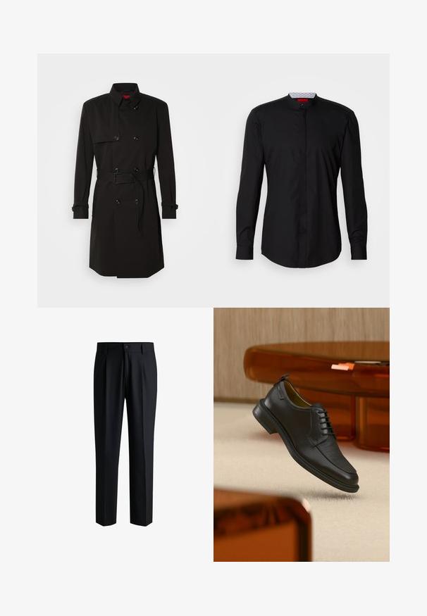 Abrigo negro de trench con diseño de doble botonadura, grandes botones, cintura con cinturón y cuello alto. Tejido suave con un acabado mate.; Camisa negra de manga larga con cuello mandarín, confeccionada en una tela suave, con cierre de botones en la parte delantera y detalles de diseño sutiles.; Pantalones negros de tela suave, con un diseño de pierna recta, pliegues en la parte delantera y cierre de botón con trabillas para cinturón.; Zapato de vestir negro de piel con cordones y parte delantera texturizada, flotando sobre una alfombra beige en una habitación moderna con muebles de tono ámbar.