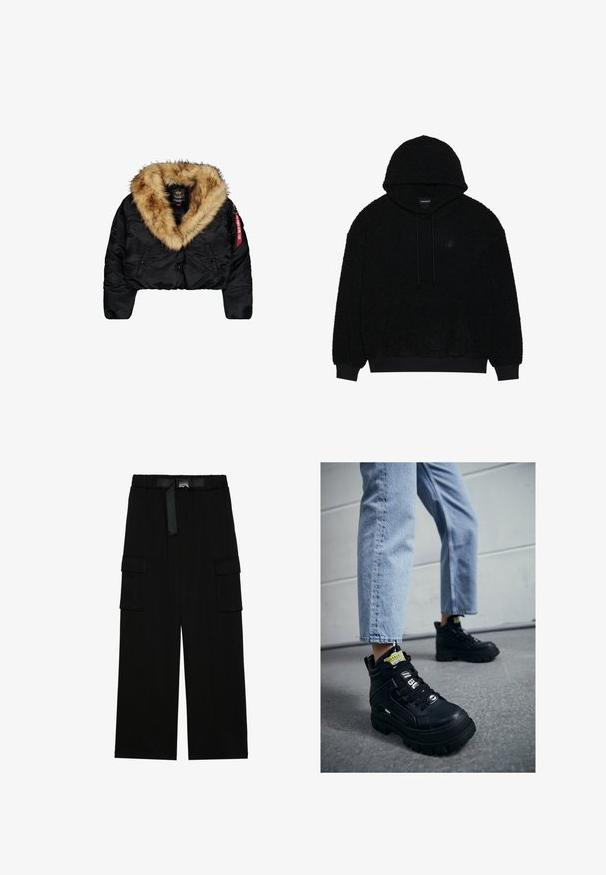 Korte zwarte jas met een grote tan nepbont kraag, voorzien van knopen aan de voorkant, zijzakken en een rode logo-tag op de mouw.; Zwarte hoodie gemaakt van textuur, fuzzy materiaal. Voorzien van een trekkoord en ribgebreide manchetten en zoom. Subtiel logodetail aan de voorkant.; Zwarte cargobroek met een wijd gesneden ontwerp, elastische tailleband met een riem, en twee grote zijzakken voor opslag.; Zwarte hoge sneakers met een chunky zool, voorzien van vetersluiting, logo-accenten en gele labels. Gdragend met lichtblauwe cropped jeans.