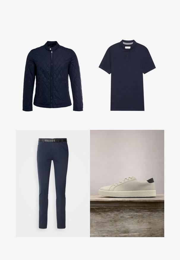 Veste matelassée bleu marine avec col montant, fermeture éclair sur le devant et deux poches latérales. Le matériau a une texture lisse avec des motifs en losange.; Polo bleu marine en tissu texturé, doté d'une patte de boutonnage à trois boutons, de manches courtes et de détails de col rayés.; Pantalons en coton bleu marine avec une coupe ajustée, dotés d'une ceinture en cuir noir texturé et de poches classiques. Design épuré, sans motifs.; Baskets blanches avec semelle texturée et détail noir au talon, flottant au-dessus d'un banc en bois avec de hautes herbes vertes en arrière-plan.