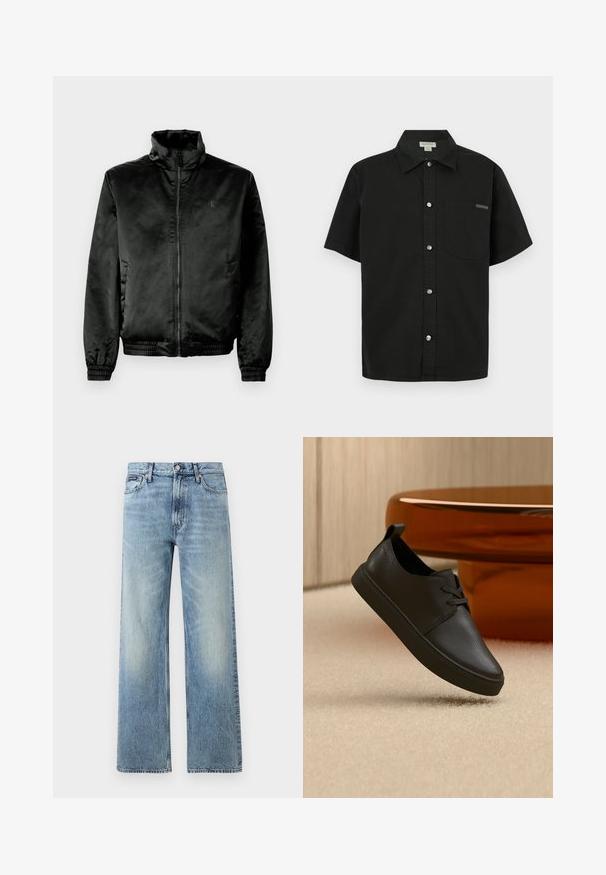 Schwarze Bomberjacke aus glattem, glänzendem Stoff mit hohem Kragen, Reißverschluss vorne und elastischen Bündchen und Saum. Minimale Markenkennzeichnung auf der Brust.; Schwarzes Kurzarmhemd aus Baumwolle mit Knopfleiste, einer einzelnen Brusttasche und kleinem Logo-Akzent in der Nähe der Tasche.; Hellblaue Jeans mit geradem Bein, hohem Bund, fünf Taschen, Knopfverschluss und dezentem Verblassen an Oberschenkeln und Knien.; Schwarzer Freizeit-Sneaker aus Leder mit Schnürsenkeln, schwebt über einem beigen Teppich, im Hintergrund ein bernsteinfarbenes, rundes Glastisch.