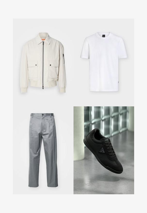 Lettet crembomberjakke med lynlås foran, to brystlommer, ribbede manchetter og en glat tekstur. Har en subtil orange accent indeni kraven.; Enkelt hvid T-shirt med korte ærmer og rund halsudskæring, med et lille sort mærke ved kraven og subtil tekstur i stoffet.; Grå bomuldsblandede bukser med lige ben-design, der har en frontknaplukning, bæltestropper og sidelommer.; Sort Guess sneaker med snørebånd og logo på siden og tungen, svævende over en poleret betongulv nær en væg af glasblokke.
