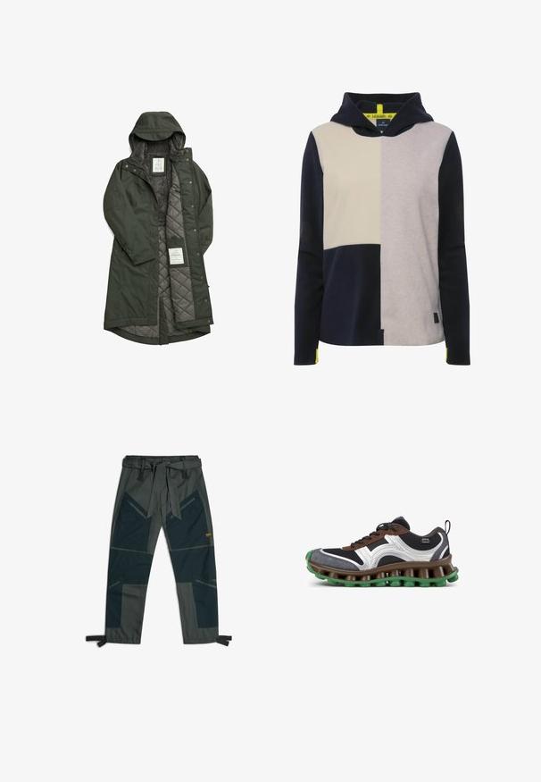 Longue manteau vert étanche avec capuche, doté d'une douce doublure en polaire grise et d'un intérieur matelassé, fermé par des boutons-pression.; Sweatshirt à capuche avec un design en patchwork en marine, crème et gris, fabriqué en matière polaire douce avec une étiquette sur l'ourlet.; Pantalons avec une ceinture, présentant un mélange de tissus vert foncé et gris, un design de patchwork angulaire, plusieurs poches et des sangles de cheville ajustables.; Chaussure de sport noire, marron et blanche avec semelle segmentée verte et marron, tige en mesh et languette de traction sur le côté du talon.