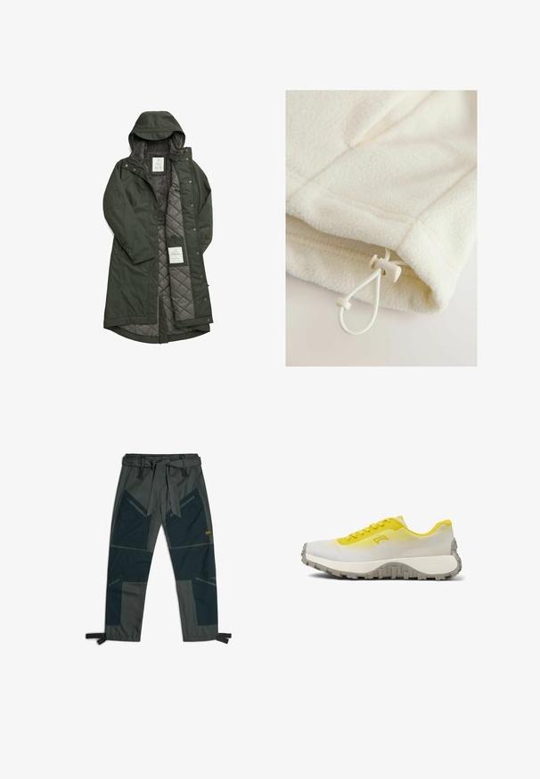 Longue manteau vert étanche avec capuche, doté d'une douce doublure en polaire grise et d'un intérieur matelassé, fermé par des boutons-pression.; Vêtement en polaire de couleur blanc cassé avec une texture douce, doté d'un cordon de serrage et d'un bouton à bascule pour l'ajustement à l'ourlet.; Pantalons avec une ceinture, présentant un mélange de tissus vert foncé et gris, un design de patchwork angulaire, plusieurs poches et des sangles de cheville ajustables.; Chaussure de sport profil bas avec une tige jaune dégradée vers un blanc cassé, semelle texturée grise et lacets jaunes, vue de côté sur fond blanc.