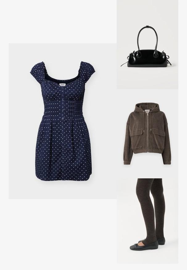 Veste en velours côtelé marron avec une capuche, fermeture éclair à l'avant, grandes poches plaquées, poignets élastiques et un design court. Texture douce avec des rayures verticales.; Robe courte bleu marine à pois blancs, avec boutons sur le devant, taille froncée et petites manches volantées.; Jambes portant des leggings côtelés foncés associés à des ballerines noires avec de petits détails en nœud sur fond blanc.; Petit sac à main noir brillant avec deux longues anses et des détails à cordon sur les côtés sur un fond clair uni.