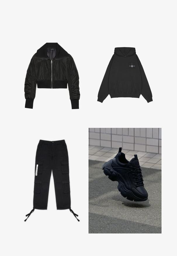 Zwarte cropped bomberjack met een rits aan de voorkant, brede kraag en geribbelde mouwen, met een gladde, glanzende textuur en een gewatteerd ontwerp.; Pegador Hoodie - washed black; Pegador TANAMI WIDE PANTS - Cargobroek - black; Zwarte leren sneaker met een chunky ontwerp, voorzien van een dikke zool, getextureerde panelen en zwarte veters. Drijvend boven een grijze stoep.