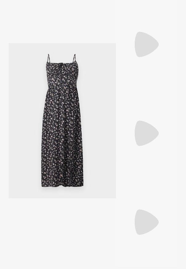 Blomstret maxi-kjole i sort stof med små lyserøde og hvide blomster, justerbare stropper, sammensynket bodice og svajende nederdel.; Hvid og beige sneaker med gummisål, svævende over grå betonoverflade med slørede trapper i baggrunden.; Brun pungtaske lavet af tekstureret syntetisk materiale med en samlet top, knyttede håndtag og en justerbar rem.; Par skinnende sølvøreringe med tynde trådlåse, vist på en lys grå baggrund.
