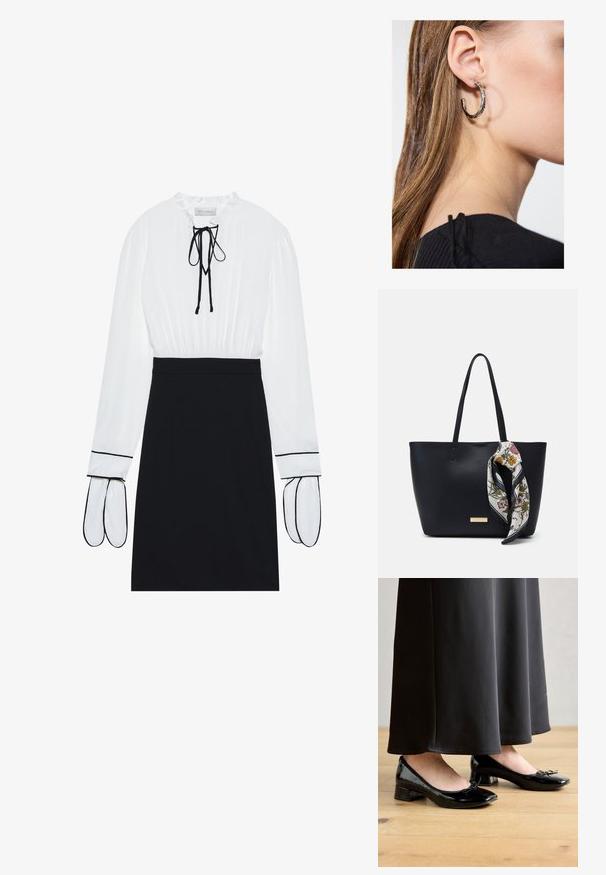 Witte blouse met een geplooide halslijn en trekkoord; zwarte fitted rok met contrasterende witte bies op de mouwen. Glad stoftextuur.; Zwarte gepatineerde ballerina's met een strikaccent, lage blokhak en ronde neus, gedragen met een lange zwarte rok op een houten vloer.; Zwarte leren tote bag met twee schouderriemen, voorzien van een zijden sjaal met bloemenprint die aan de handgreep is geknoopt en een metallic logo-accent aan de voorkant.; Zilveren oorbel met een gepolijste afwerking, met kleine gouden accentdetails en een ronde vorm, gedragen op de oorlel.