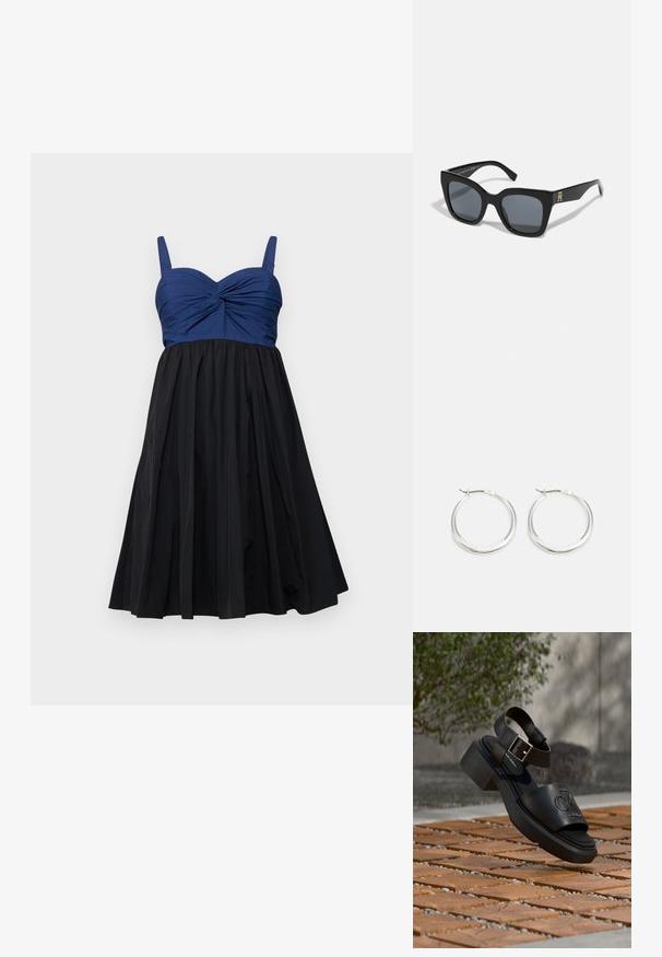 A-Linien-Kleid mit einem taillierten Oberteil in Marineblau mit einer gedrehten Detail und einem schwarzen, plissierten Rock, abgeschlossen mit verstellbaren Trägern.; Schwarze Leder-Sandale von Calvin Klein mit Knöchelriemen und Schnalle, schwebt über einem Boden aus Holz und Steinplatten im Freien.; Schwarze Sonnenbrille mit einer markanten quadratischen Form, ausgestattet mit dunklen Gläsern und einem goldenen Logoakzent an einem Bügel. Hergestellt aus glänzendem Kunststoffmaterial.; Silberne Creolen zeichnen sich durch ein glattes, rundes Design mit einem schlanken Profil und einem sicheren Verschluss aus. Minimalistischer Stil mit glänzender Oberfläche.