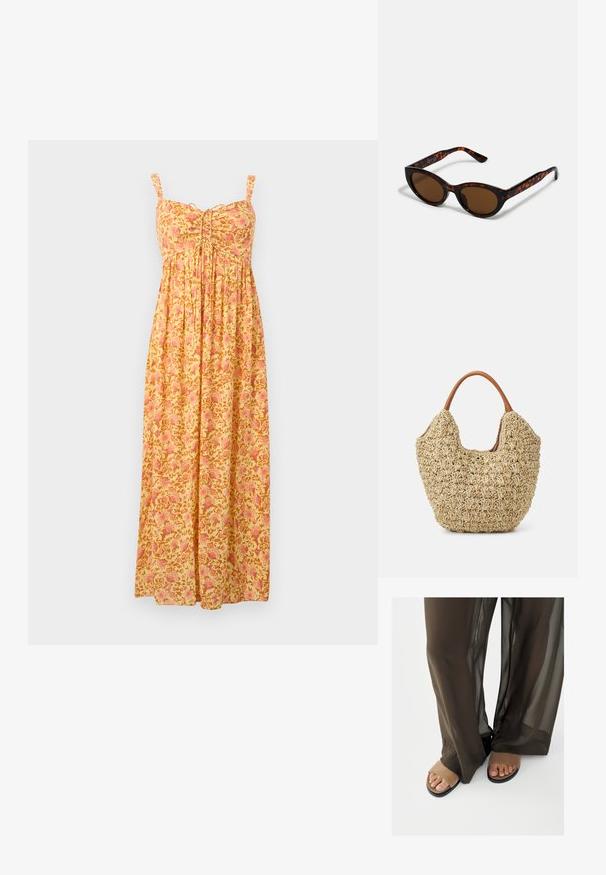 Robe longue jaune avec motif floral rose, bretelles sans manches, bustier froncé et jupe ample plissée.; Pieds en sandales ouvertes en suède beige partiellement recouverts par un pantalon large en tissu transparent marron foncé sur fond blanc.; Lunettes de soleil en écaille de tortue marron avec une forme vintage de lunettes cat-eye et des verres marron. Présente des branches courbées avec des accents rouges.; Sac fourre-tout en paille tissée avec une texture naturelle et une forme douce et organique, doté de poignées en cuir brun pour un transport facile.