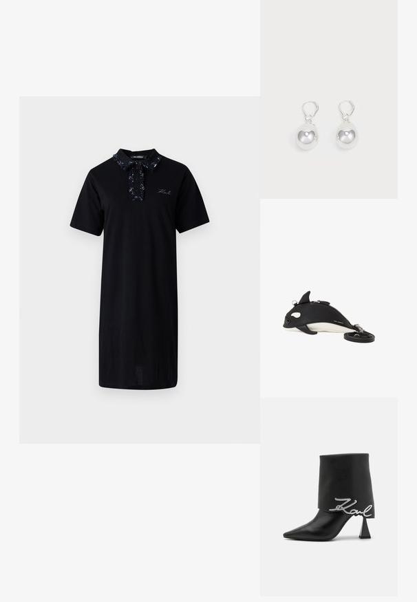 Vestido negro de manga corta hecho de algodón, con un cuello estampado, placket abotonado y detalle de logotipo bordado en el pecho.; Botín de cuero negro con punta afilada, tacón alto y grueso, y parte superior doblada con un detalle del logo plateado "Zaul".; Bolso bandolera en forma de orca en blanco y negro con cierre de cremallera, pequeños detalles de aletas y correa desmontable enrollada a su lado.; Pendientes de plata en forma de gota con superficies redondas y reflectantes colgando de cierres de palanca. El fondo es blanco liso.