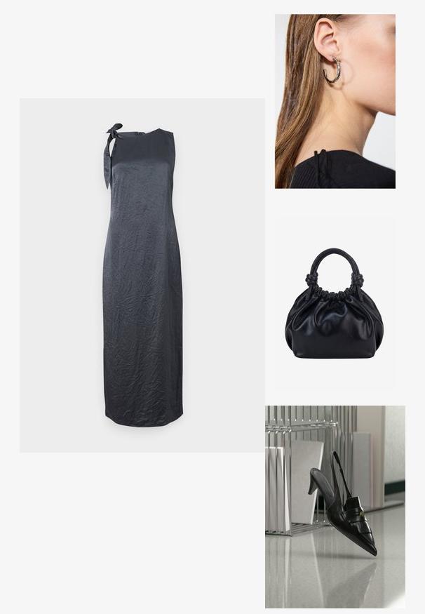 Vestido negro sin mangas con un detalle de lazo en el hombro izquierdo, hecho de una tela suave y arrugada, que presenta una silueta recta y un corte hasta la rodilla.; Zapato de tacón destalonado de cuero negro con puntera puntiaguda, flecos y detalle de botón dorado sobre un suelo reflectante cerca de soportes metálicos para archivos.; Bolso de mano de cuero negro suave con parte superior fruncida y dos asas gruesas atadas en nudos sobre un fondo claro y liso.; Pendiente de aro de plata con un acabado pulido, que presenta pequeños detalles en dorado y una forma redonda, llevado en el lóbulo.